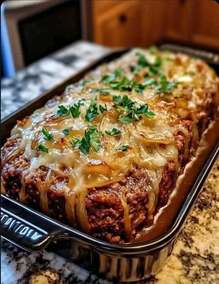 Savory Meatloaf with Caramelized Onion Gravy FB_IMG_1774131934687
